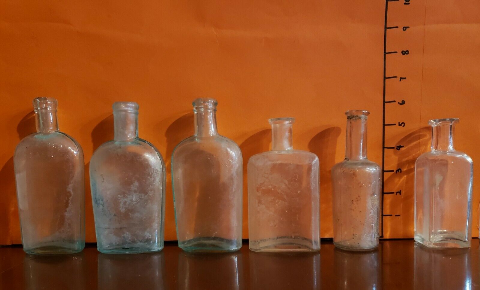 6 -  Antique Embossed Apothecary Glass Bottles Lot M